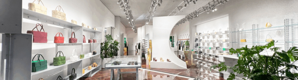 Interior render of Bottega Veneta boutique in Los Angeles, showcasing luxury retail architecture with custom displays, unique lighting, and LEED-certified sustainable design.