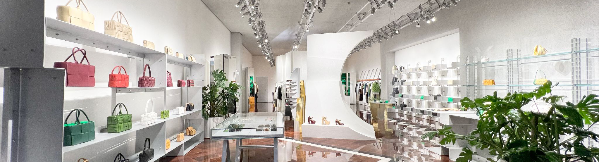 Interior render of Bottega Veneta boutique in Los Angeles, showcasing luxury retail architecture with custom displays, unique lighting, and LEED-certified sustainable design.